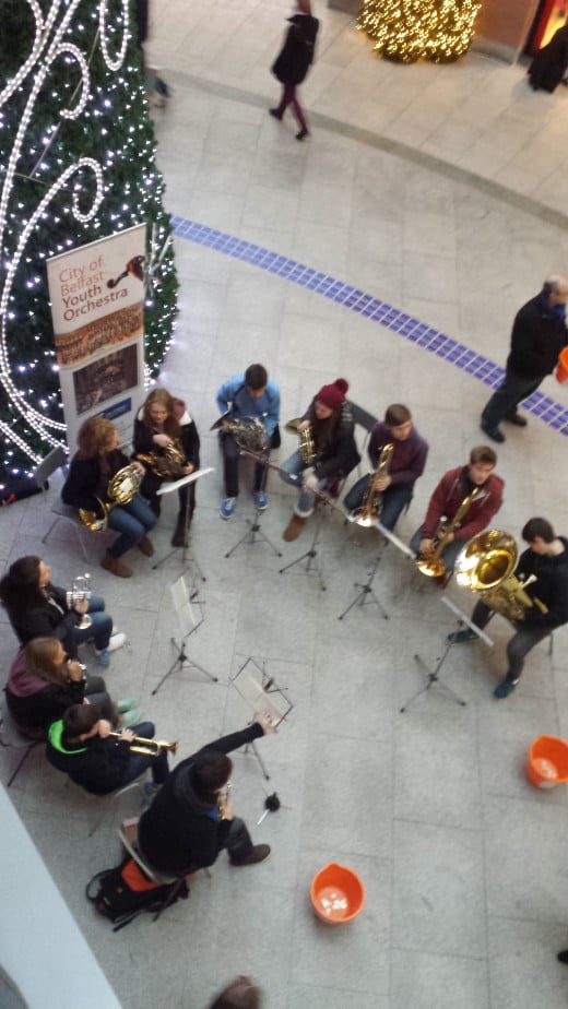 Playing in a shopping center at Christmas is a good way to raise money and awareness for groups and charities.