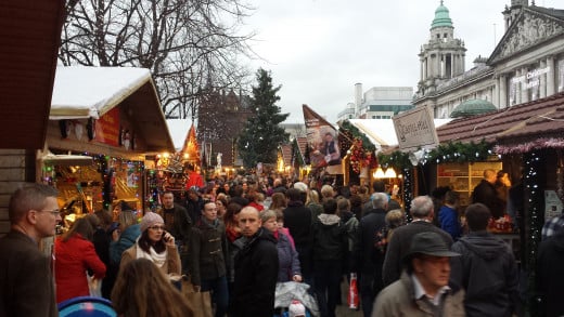 A crowded city market at Christmas time. Your potential audience.
