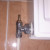 A Radiator Lock shield with cap removed, exposing gland nut. A Radiator Lock shield with cap removed, exposing gland nut.