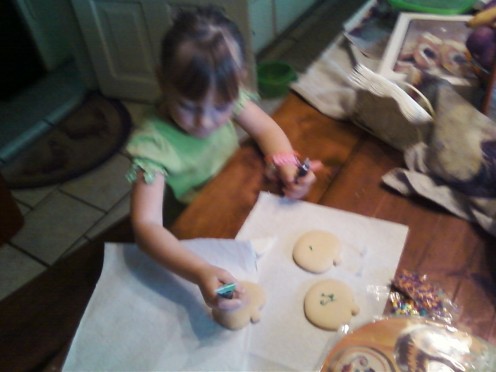 2) Carefully spread your cookies out for hand decorating. 