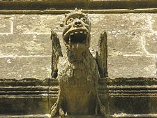 This is not a model for a Rolling Stone’s album, it is a gargoyle found in ecclesiastical architecture. 