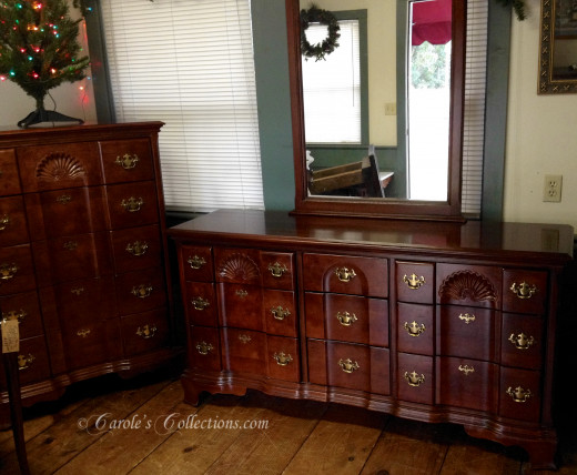 Solid wood bedroom furniture with serpentine front.