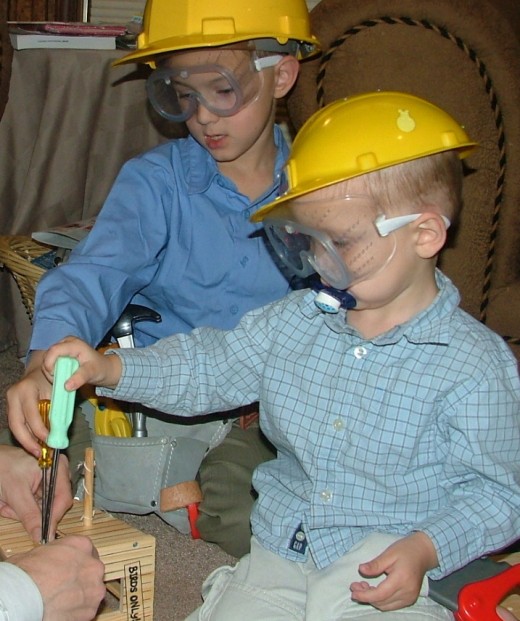 Building a bird house during the lesson on home construction