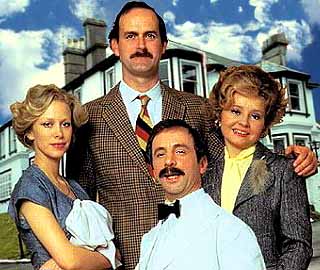Basil and Sybil Fawlty with Polly and Manuel