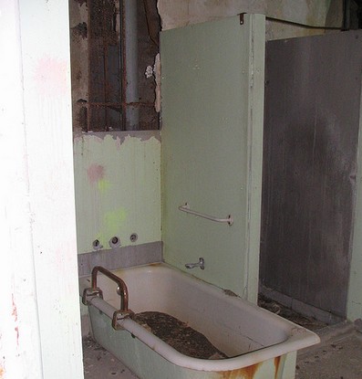 One of the many bathrooms at Waverly Hills Sanatorium. It is claimed that a nurse was known to drown people in this particular bathtub. Loud splashes and screams are said to be heard here in this particular bathroom quite often. 