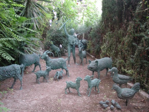 Statues of Various Farmyard Animals with a Farmer