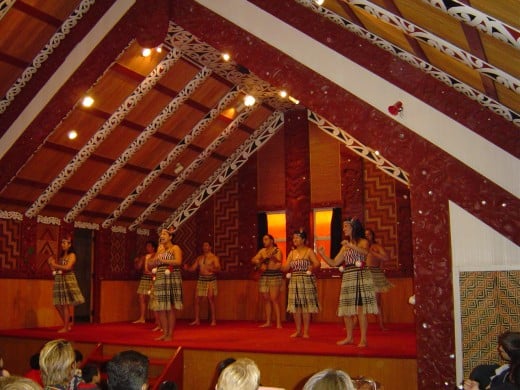 The exciting Maori Dance troupe perform the Haka a war chant and native dances in a Pa or Maori Meeting house  