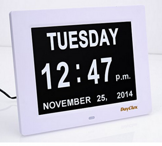 You'll have to click the link in the text to the right to see this beautiful day clock (and others)
