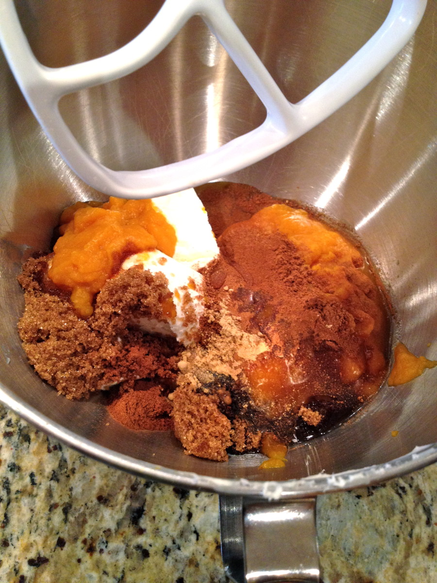 Start with cream cheese, brown sugar and pumpkin and beat at medium speed. Next add syrup, spices, and vanilla extract.