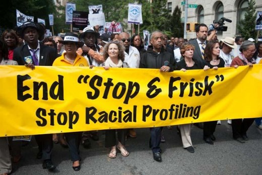 "Reverend Al Sharpton and marchers participated in silent march in opposition to the NYPD's stop and frisk tactics."