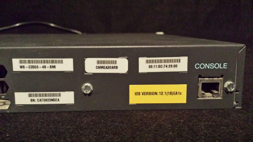 A close-up of the machine-tags, and console port