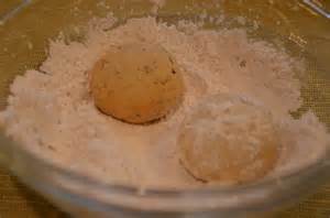 Roll balls in powdered sugar