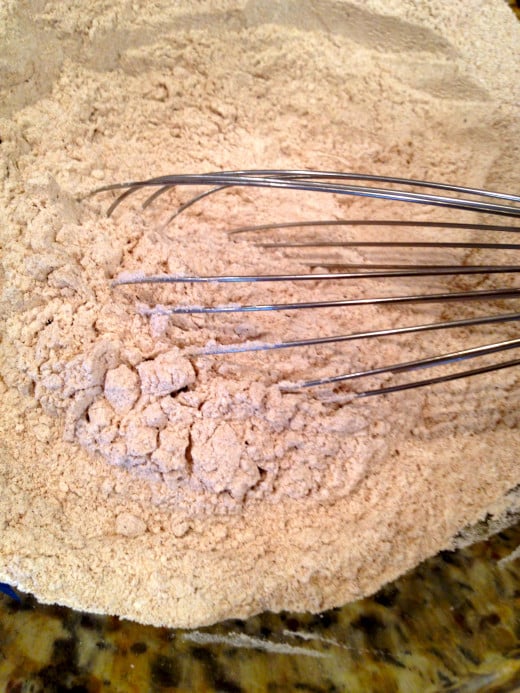 Whisk dry ingredients and make a well in the center to add wet ingredients.
