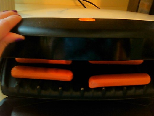 Hot dogs in countertop electric grill.  Can boil or heat in a skillet if desired.