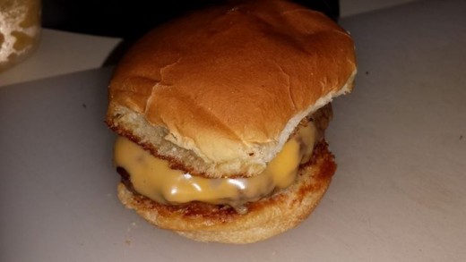 Cheeseburgers on garlic bread buns. "Slider" size buns were buttered and then browned in a pan sprinkled with garlic salt.   Not a required step, but it's amazing.