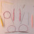 Circular knitting needles.