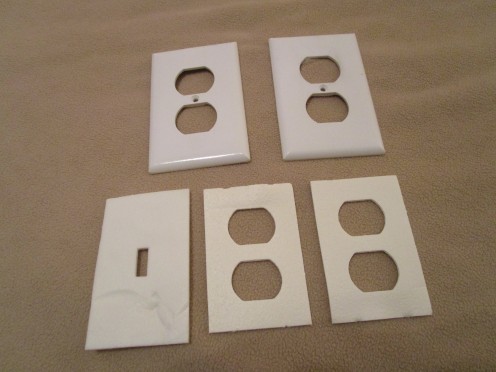 The top two items are the actual electrical socket plates.  The three items below are the foam inserts. You can see they come in different styles to match your cover plate.