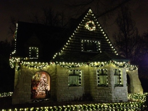 Beautiful home, decorated for the holidays.  There was an amazing scene inside the window also.  Just beautiful, and the picture doesn't capture it. 
