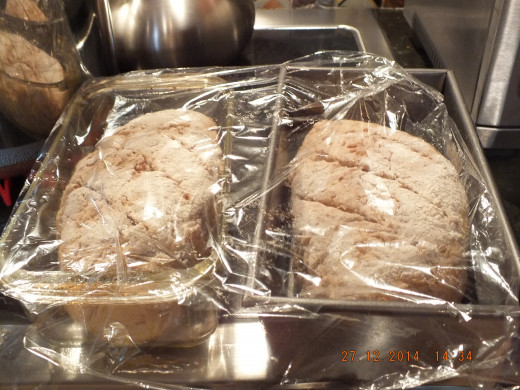 Take the plastic wrap from the overnight ferment bowl and just gently lay it across the loaves so they don't dry out. They will probably rise for about 1 1/2 to two hours. It just depends on how warm your kitchens is.
