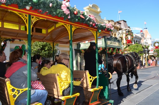 Mornings at The Magic Kingdom at Walt Disney World have horse-drawn rail carriages clopping down Main Street U.S.A. Just another treat Christmas holiday treat you'll find during Thanksgiving Week.