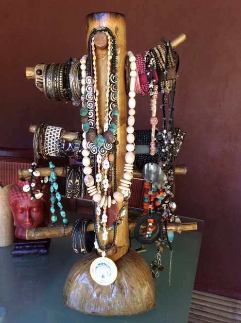 This was the first bamboo jewelry stand with a coconut husk base. It wasn't sufficient to my needs so I had a larger one made.