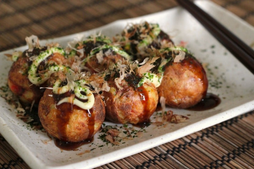 Takoyaki is usually bought at street stands but can be bought in restaurants or made at home. 