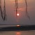 A very different view and color of the sun in this photo.  This one is called sunset at Padma river 