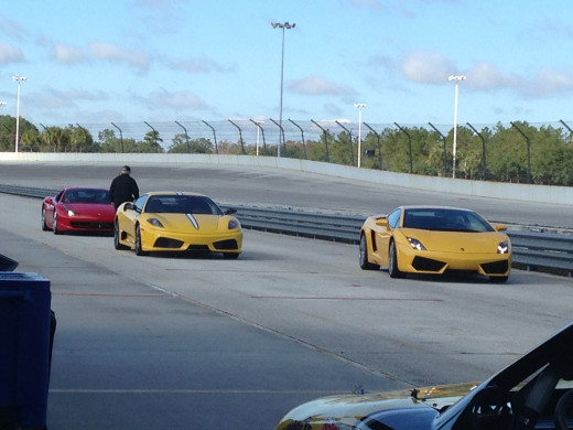 I am 90% sure this is two Ferraris and one Lamborghini. 