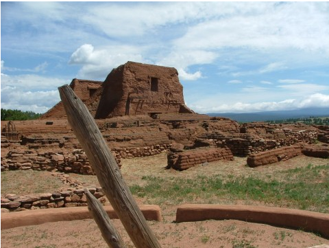 This ladder leads down into the kiva. A Catholic Spanish Mission mere yards from the entrance to the Pecos Pueblo kiva.