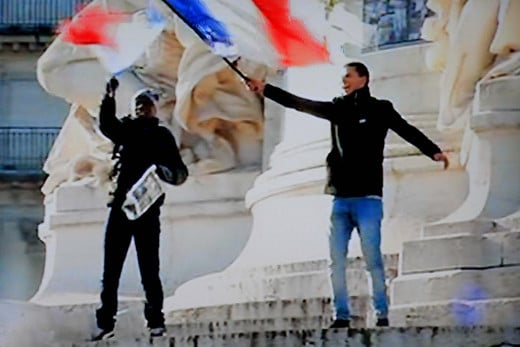 The French flag flies in the Place de la République on Sunday 11th January 2015