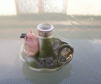 This is a rare lighthouse fairing which sold for $51. This is a rare lighthouse fairing which sold for $51.