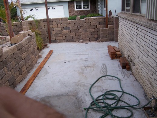 The plants above were here under a different wooden shade area which deteriorated, so we poured a slab and built the walls.