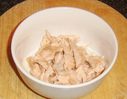 Flaked rainbow trout flesh