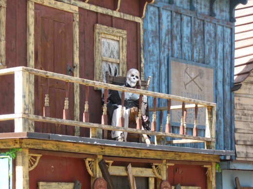 Relaxing on the second floor balcony of the Trail Dust Town saloon in Alkali Flat