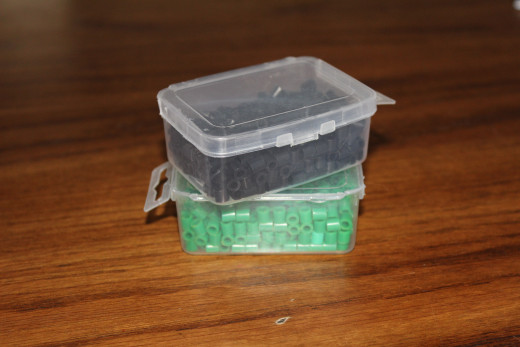 Black and green melty beads for Creeper face