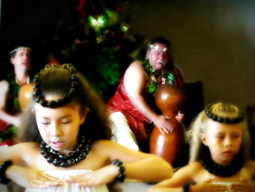 Hula Dancers Wearing Kukui Nut Leis