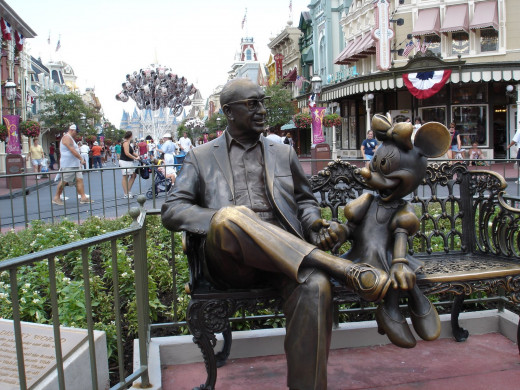 statue of roy disney and minnie mouse