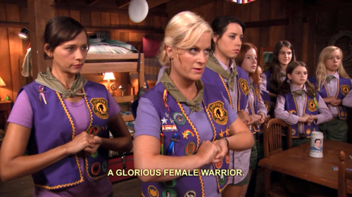 Leslie leading her scout troop with Anne and April