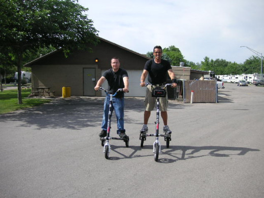 Trikke riders. Unlike the daredevils in the photo, you should ALWAYS wear a bicycle helmet while tricking.