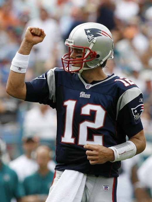 Tom Brady flexes his "muscle." A sign of how good HE is