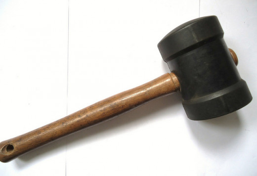 Rounded edges on the mallet help keep the hammer from damaging the glove. The last thing you want to do is tear the leather on an expensive glove you just bought.