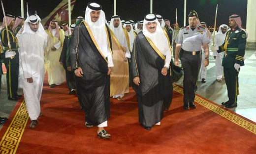 The late King Abdullah with his Qatari counterpart. Both countries are governed by their respective royal families. 