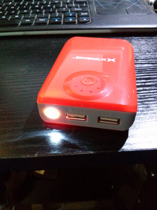 This power bank also has a small built in LED light.  Although its small and doesn't put out the same amount of light as a small flashlight, it is still better than having nothing.