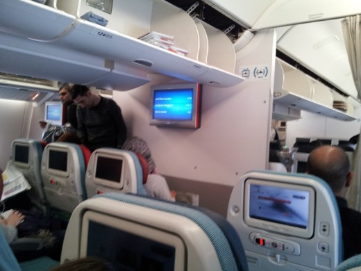 Aboard the B777-300ER The cabin has a calming and soothing ambience despite its vibrant seat colours.