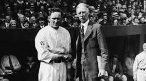 Philadeophia Athletics, Connie Mack, shakes hands with Walter Johnson
