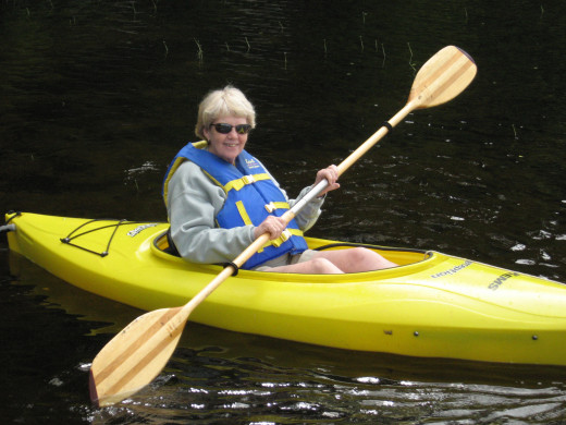 Here I am, enjoying a cool day on the lake in New Hampshire. You can get paddles that come apart for more compact storage. Great idea, then they will fit in a deck box and not be outside exposed to the weather.