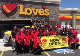 These employees are celebrating the grand opening of Loves truck stop