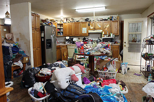 In this picture the hoarder has at least kept  paths to get around somewhat in the mess
