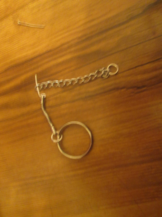 A trimmed headpin is used to attach your chains to your keyring. 