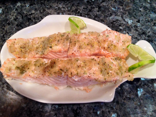 Baked Salmon with Ginger Relish Served with Sliced Lime